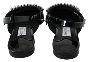 Elegante schwarze Lack-Flats mit Kristall-Akzent