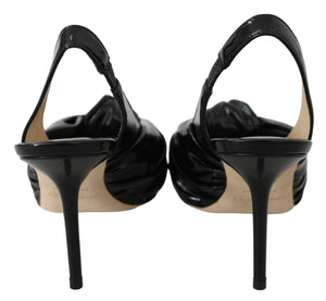 Elegante Pumps aus schwarzem Leder mit spitzer Zehe