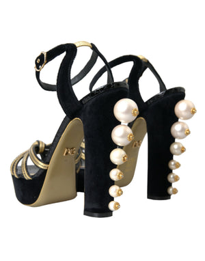 Schwarze, goldene Sandalen mit Verzierungen und Absatz