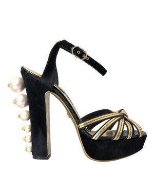 Schwarze, goldene Sandalen mit Verzierungen und Absatz