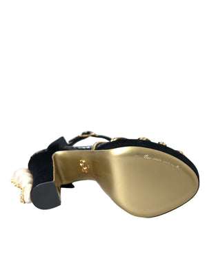 Schwarze, goldene Sandalen mit Verzierungen und Absatz