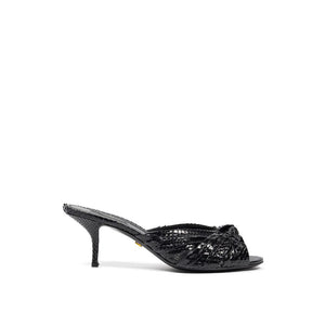 Sandalen mit Schlangenhaut-Print und Plateauabsatz in Schwarz