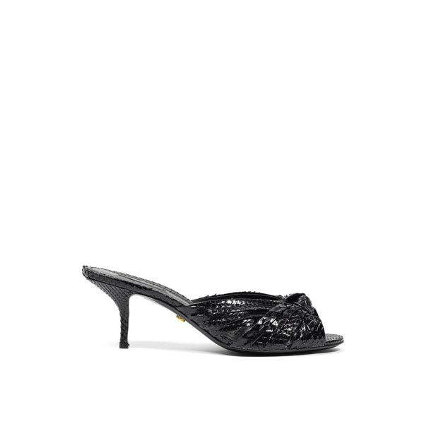 Sandalen mit Schlangenhaut-Print und Plateauabsatz in Schwarz