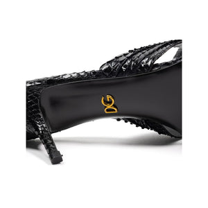Sandalen mit Schlangenhaut-Print und Plateauabsatz in Schwarz