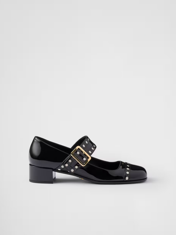 Mary Jane Pumps aus schwarzem Lackleder