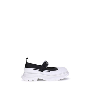 Schwarze Gummiballerinas