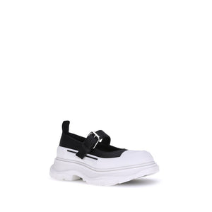 Schwarze Gummiballerinas