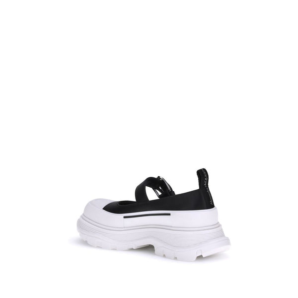 Schwarze Gummiballerinas