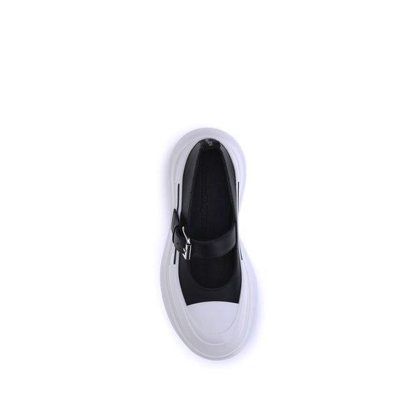 Schwarze Gummiballerinas