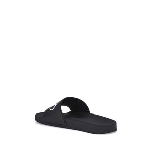 Flache Gummisandalen in Schwarz