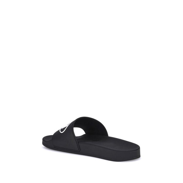 Flache Gummisandalen in Schwarz