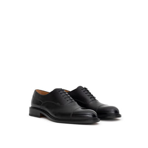 Schwarze Leder-Schnürschuhe und -Derby-Schuhe