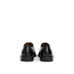 Schwarze Leder-Schnürschuhe und -Derby-Schuhe