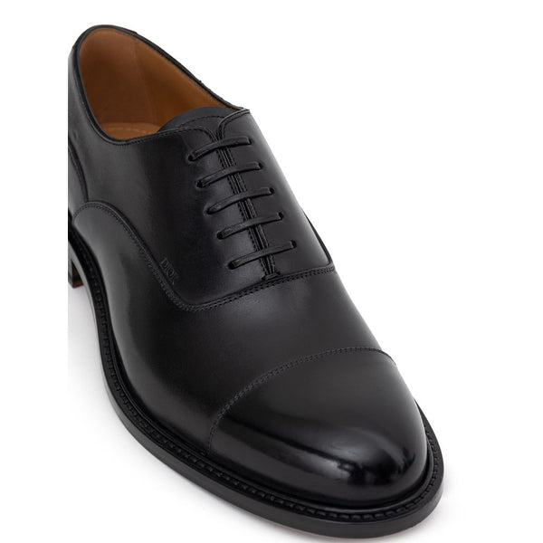 Schwarze Leder-Schnürschuhe und -Derby-Schuhe
