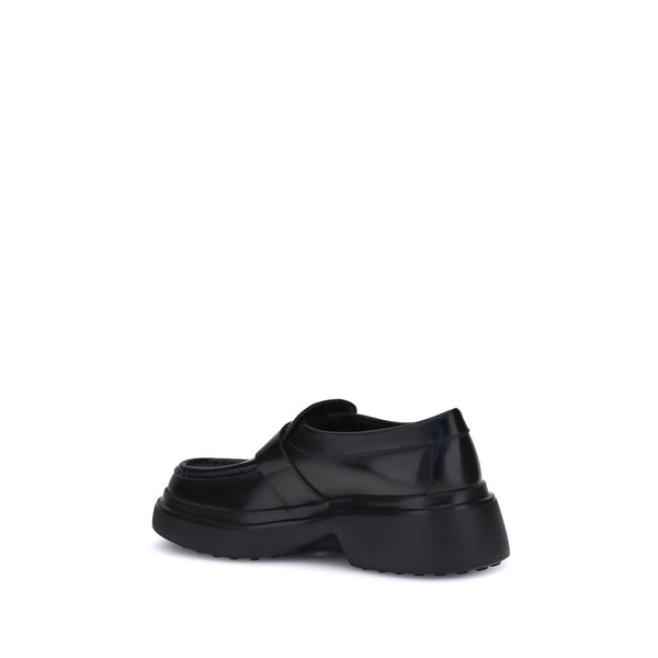 Schwarze Plateau-Loafer aus Gummi