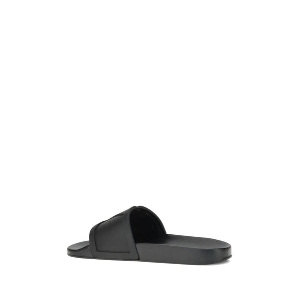 Flache Gummisandalen in Schwarz