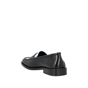 Elegante schwarze Lederslipper