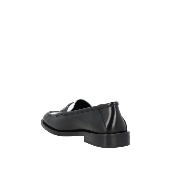 Elegante schwarze Lederslipper