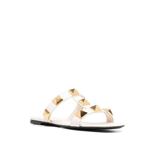 Flache Sandalen aus weißem Kalbsleder