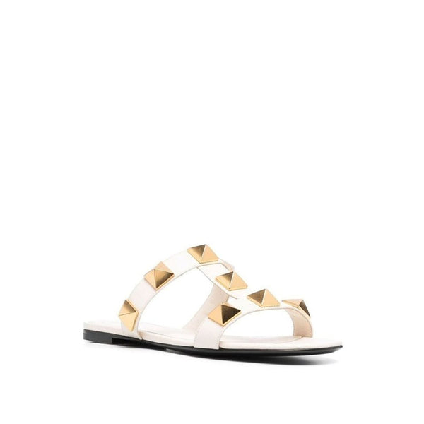 Flache Sandalen aus weißem Kalbsleder