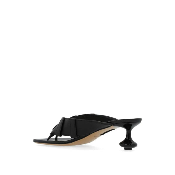 Schwarze Sandalen mit Lammlederriemen