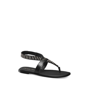 Flache Sandalen aus schwarzem Kalbsleder