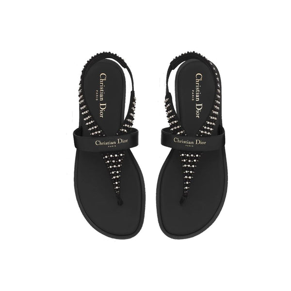 Flache Sandalen aus schwarzem Kalbsleder
