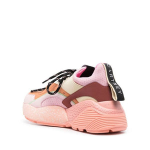 Klobige Sneaker aus orangefarbenem Polyethylen
