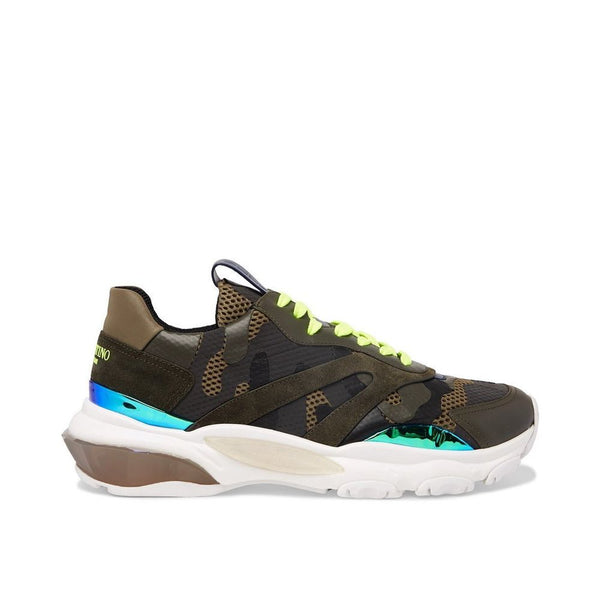 Grüne Stoff-Sportschuhe