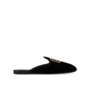 Schwarze Mules aus Kalbsleder
