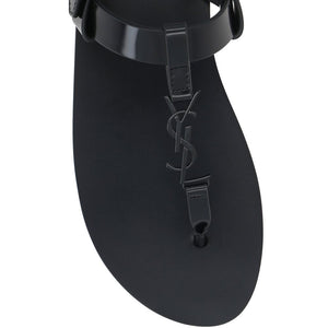 Flache Sandalen aus schwarzem Kalbsleder