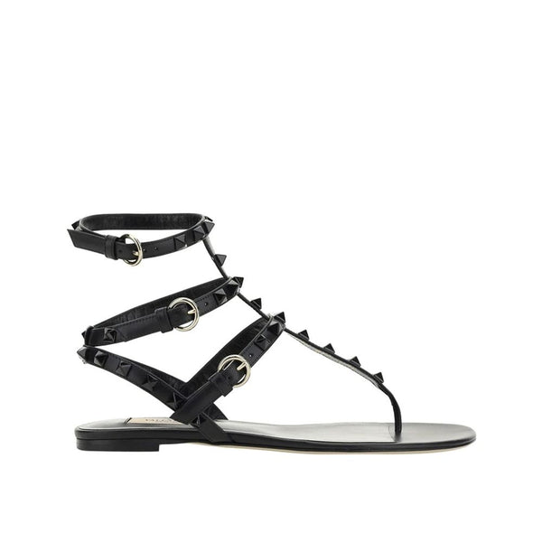 Flache Sandalen aus schwarzem Kalbsleder