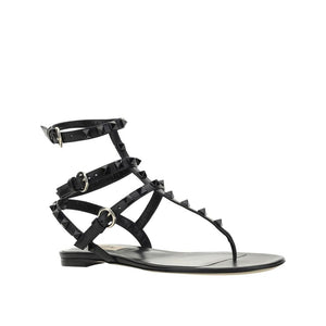 Flache Sandalen aus schwarzem Kalbsleder