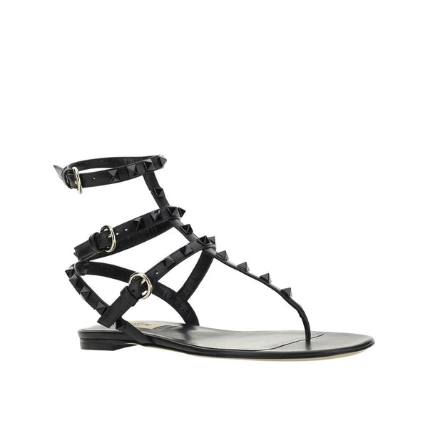Flache Sandalen aus schwarzem Kalbsleder