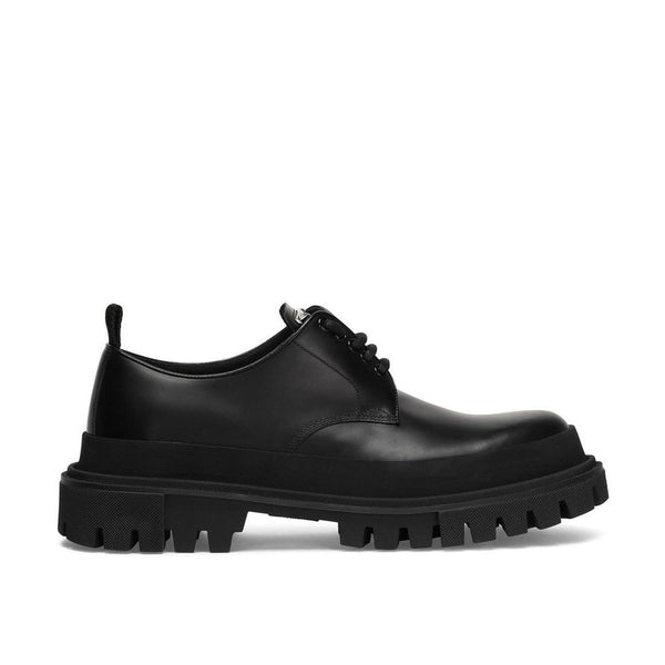 Schwarze Oxford- und Derby-Schuhe aus Kalbsleder