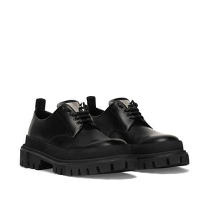 Schwarze Oxford- und Derby-Schuhe aus Kalbsleder