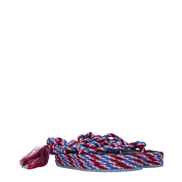 Flache Sandalen aus blauem Stoff