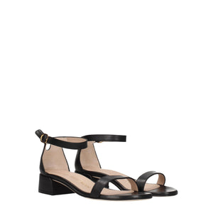 Flache Sandalen aus schwarzem Leder