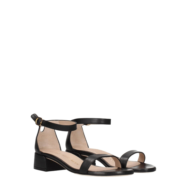 Flache Sandalen aus schwarzem Leder