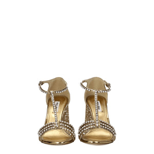 Goldene Plateausandalen aus Kunststoff
