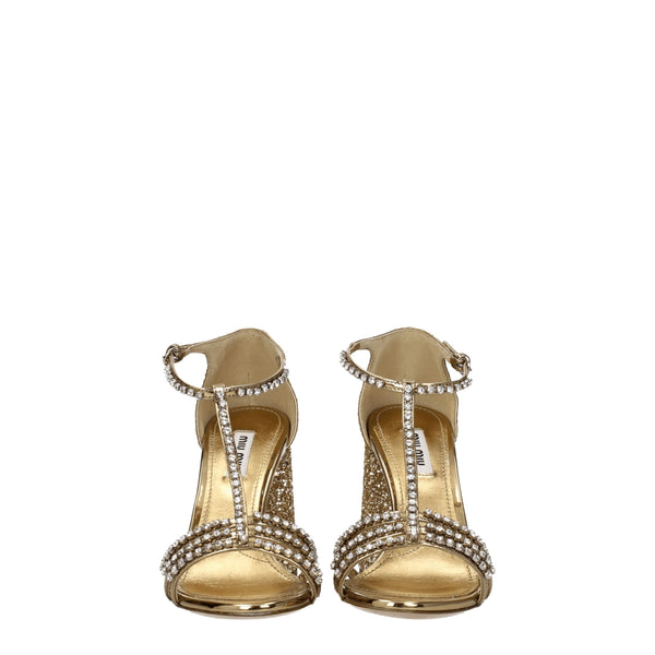 Goldene Plateausandalen aus Kunststoff