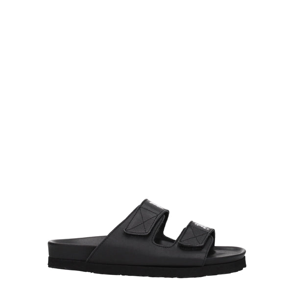 Flache Sandalen aus schwarzem Leder