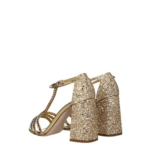 Goldene Plateausandalen aus Kunststoff
