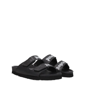 Flache Sandalen aus schwarzem Leder