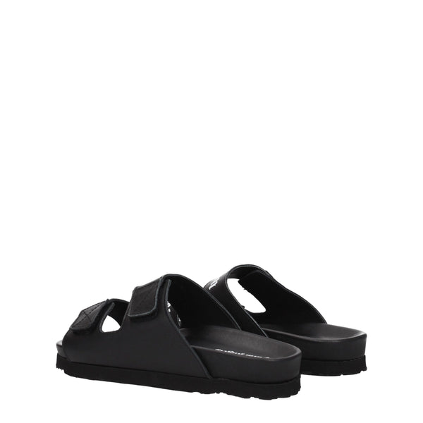 Flache Sandalen aus schwarzem Leder