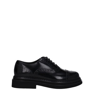 Schwarze Leder Oxfords und Derbies
