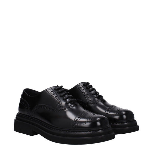 Schwarze Leder Oxfords und Derbies