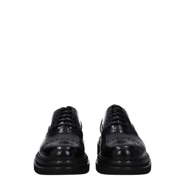Schwarze Leder Oxfords und Derbies