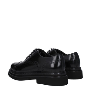 Schwarze Leder Oxfords und Derbies