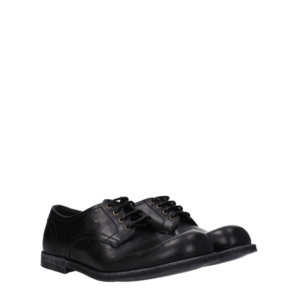 Schwarze Leder Oxfords und Derbies